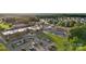 Overhead image displaying a building complex with parking and landscaping, surrounded by homes and greenery at 21013 Running Creek Dr # 4, Locust, NC 28097