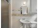 Bathroom with a shower, pedestal sink, and a mirrored cabinet at 220 Lakeview Dr, Belmont, NC 28012