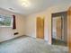 Bedroom with a window and views of the yard at 220 Lakeview Dr, Belmont, NC 28012