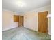 Bedroom featuring carpet flooring and a closet at 220 Lakeview Dr, Belmont, NC 28012