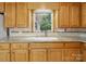 Inviting kitchen with granite countertops and ample natural light at 220 Lakeview Dr, Belmont, NC 28012