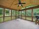Bright, airy sunroom with wood paneled ceiling and walls of windows offering beautiful views at 220 Lakeview Dr, Belmont, NC 28012