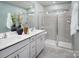 Modern bathroom featuring double vanity, walk-in shower, and contemporary finishes at 2485 Hedgecliff Rd, Kannapolis, NC 28025