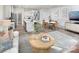 Open concept living area featuring a seamless blend with the kitchen and dining space at 2485 Hedgecliff Rd, Kannapolis, NC 28025