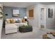 Cozy living room with comfortable seating, textured wall, and neutral tones at 2485 Hedgecliff Rd, Kannapolis, NC 28025