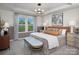 Serene bedroom with neutral colors, large window, and stylish furnishings at 2485 Hedgecliff Rd, Kannapolis, NC 28025