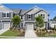 Attractive townhome exterior with manicured landscaping, inviting entrance, and attached single-car garage at 3095 Big Bend Dr, Kannapolis, NC 28025
