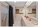 Functional bathroom featuring a shower, neutral walls and a double sink vanity at 3500 Sunningdale Ln # 221, Statesville, NC 28625