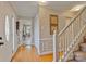 Inviting entryway with hardwood floors, stairway, and access to multiple rooms at 3500 Sunningdale Ln # 221, Statesville, NC 28625