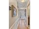 Hallway features hardwood floors, decorative molding, and doorways leading to various rooms at 3500 Sunningdale Ln # 221, Statesville, NC 28625