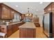 Large kitchen with granite countertops, stainless steel appliances, and hardwood floors at 3500 Sunningdale Ln # 221, Statesville, NC 28625
