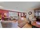 A well-lit living room is beautifully appointed with hardwood floors, a plush rug, and comfortable seating at 3500 Sunningdale Ln # 221, Statesville, NC 28625