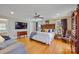A serene main bedroom featuring hardwood floors, natural light, and a soothing ambiance at 3500 Sunningdale Ln # 221, Statesville, NC 28625