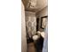 Compact bathroom with a patterned shower curtain, modern vanity, and neutral color scheme at 3715 Patricia Nw Dr, Concord, NC 28027