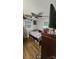 Small bedroom with hardwood floors, good natural light, and ceiling fan at 3715 Patricia Nw Dr, Concord, NC 28027