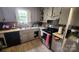 Kitchen area showcasing countertops, a double basin sink, and stainless steel appliances at 3715 Patricia Nw Dr, Concord, NC 28027