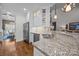 Kitchen with granite countertops, stainless appliances and breakfast bar at 4004 Saint Andrews Ct, Cramerton, NC 28032