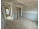 Bedroom with door to closet and entry to another room at 4040 Grommet Ct, Matthews, NC 28105