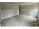 Bedroom with two doors and newly installed base trim at 4040 Grommet Ct, Matthews, NC 28105