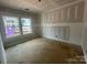New construction bedroom with large windows allowing plenty of natural light to fill the room at 4040 Grommet Ct, Matthews, NC 28105