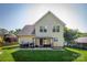 Backyard with level lawn, trampoline, covered patio, and grill offers plenty of room for entertaining at 418 Eastway Sw Ln, Conover, NC 28613