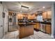 Spacious kitchen with stainless steel appliances, wooden cabinets, and an island at 418 Eastway Sw Ln, Conover, NC 28613