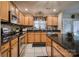 Kitchen features granite countertops, stainless steel appliances, and abundant cabinetry at 418 Eastway Sw Ln, Conover, NC 28613