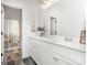 A bright bathroom featuring double sinks, white cabinets, and a separate toilet and shower room at 482 Lucky Nw Dr, Concord, NC 28027