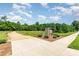 Property entrance sign surrounded by manicured landscaping at 482 Lucky Nw Dr, Concord, NC 28027