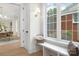 Charming hallway with large window, built-in seating, and views into adjacent rooms at 514 W Cama St, Charlotte, NC 28217