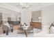 Open-concept living room with view into kitchen, modern furnishings, and stylish decor at 514 W Cama St, Charlotte, NC 28217