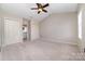 Large bedroom with walk-in closet and ensuite bathroom, offering ample space and convenience at 600 Capella Ct, Gastonia, NC 28056