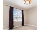 Cozy bedroom with natural light, featuring neutral paint and carpeted floors at 600 Capella Ct, Gastonia, NC 28056