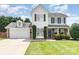Charming two-story home with a well-maintained lawn and a two-car garage at 600 Capella Ct, Gastonia, NC 28056