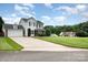 Two-story home featuring a spacious lawn and two-car garage at 600 Capella Ct, Gastonia, NC 28056