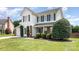 Traditional home with two-car garage and well-manicured front yard at 600 Capella Ct, Gastonia, NC 28056