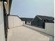 Rooftop terrace with metal railing, perfect for relaxing and enjoying panoramic views of neighborhood at 6013 Countess Dr # 51, Charlotte, NC 28217