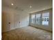 Bright bedroom featuring modern recessed lighting, neutral paint color, and natural light at 6013 Countess Dr # 51, Charlotte, NC 28217