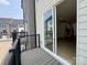 A view from the outdoor patio, looking in through the sliding glass door into the house at 6013 Countess Dr # 51, Charlotte, NC 28217