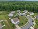 A neighborhood with lush trees and manicured lawns showcase well-maintained homes in an attractive setting at 6017 Fazio Ct, Harrisburg, NC 28075