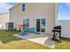 Backyard featuring a patio, grill, small play house and outdoor seating at 7172 Teague Dr, Gastonia, NC 28056