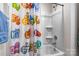 Shower and tub featuring shower curtain with animals and letters at 7172 Teague Dr, Gastonia, NC 28056