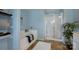 This main bathroom features a combination tub and shower, tiled floors, and a sleek design at 7209 Cuddington Dr, Charlotte, NC 28215