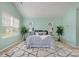 A main bedroom showcases a comfortable bed with decorative pillows and adjacent end tables at 7209 Cuddington Dr, Charlotte, NC 28215