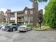 Exterior view of the building with a well-maintained facade and parking area at 8183 Cedar Glen Dr, Charlotte, NC 28212