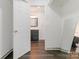 Hallway view looking into bathroom featuring vanity and mirror at 8183 Cedar Glen Dr, Charlotte, NC 28212