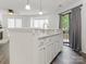 Open kitchen area with a breakfast bar featuring pendant lighting at 8183 Cedar Glen Dr, Charlotte, NC 28212