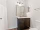 Cozy bathroom with a large vanity and well-lit mirror, shower, and toilet at 8202 Cedar Glen Dr, Charlotte, NC 28212