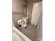 Bathroom featuring a toilet, bathtub, and vanity with tiling on the floor at 921 Nottingham Dr # 6, Gastonia, NC 28054