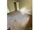 A bedroom with neutral walls and carpet flooring, featuring a closet and ample space at 921 Nottingham Dr # 6, Gastonia, NC 28054